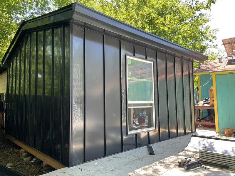 Black standing seam metal wall panels for Metal Roof Installation in Orleans