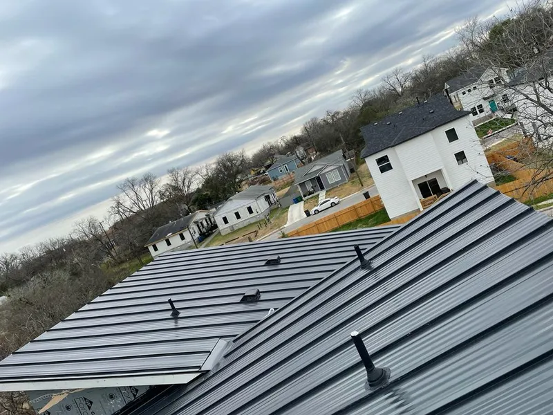 Standing seam metal roof panels with vents for Skylight Repair in Orleans